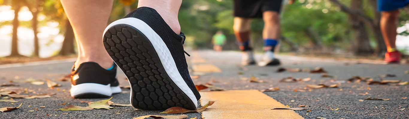 jogging shoes on pavement