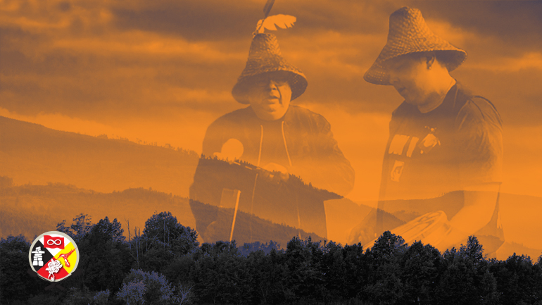 Aboriginal father and son playing drums