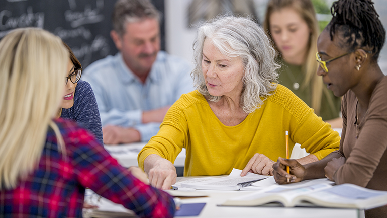 senior learning in classroom