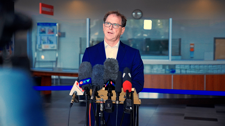 Minister of Health Adrian Dix speaking at podium