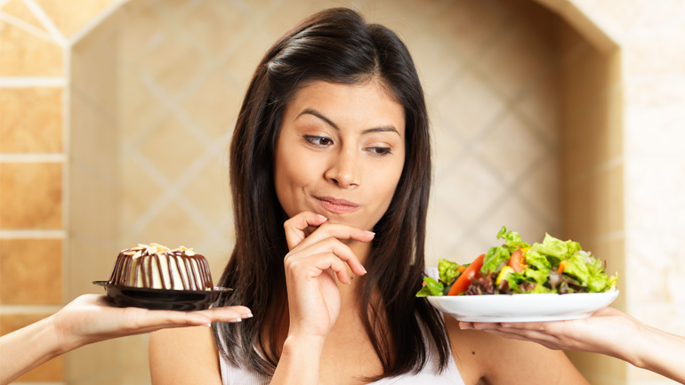 Woman choosing what food to eat