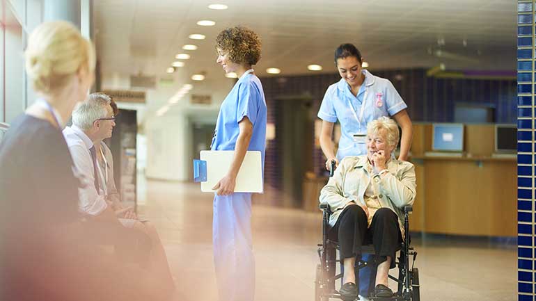 Nurse talking to patients