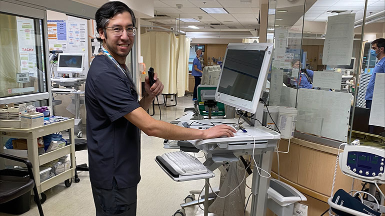 Dr. Patrascu using the handheld Front-End-Speech-Recognition microphone