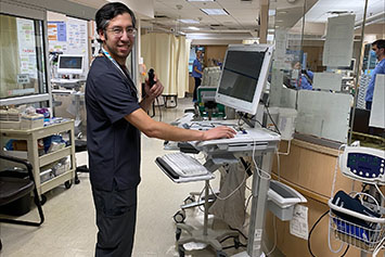 Dr. Patrascu using the handheld Front-End-Speech-Recognition microphone