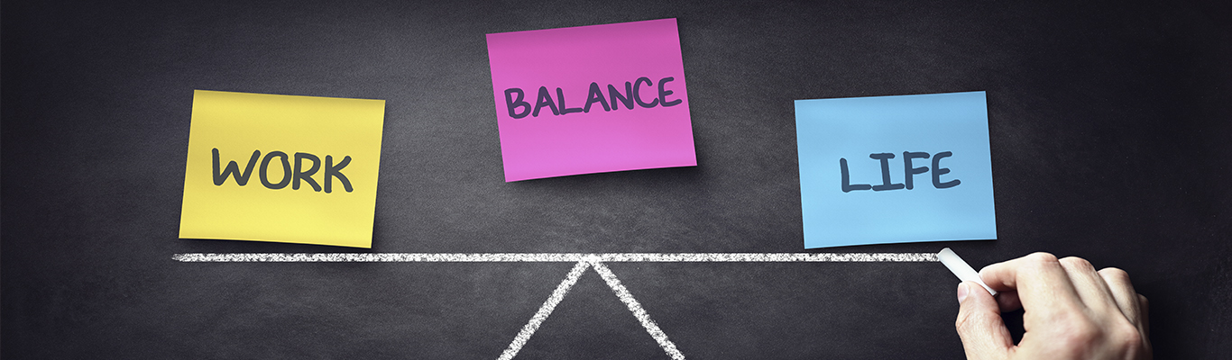 a scale with three notes that say "work" "balance" "life"