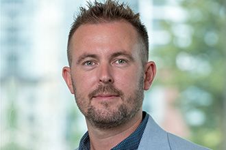 a headshot of Rich Dillon