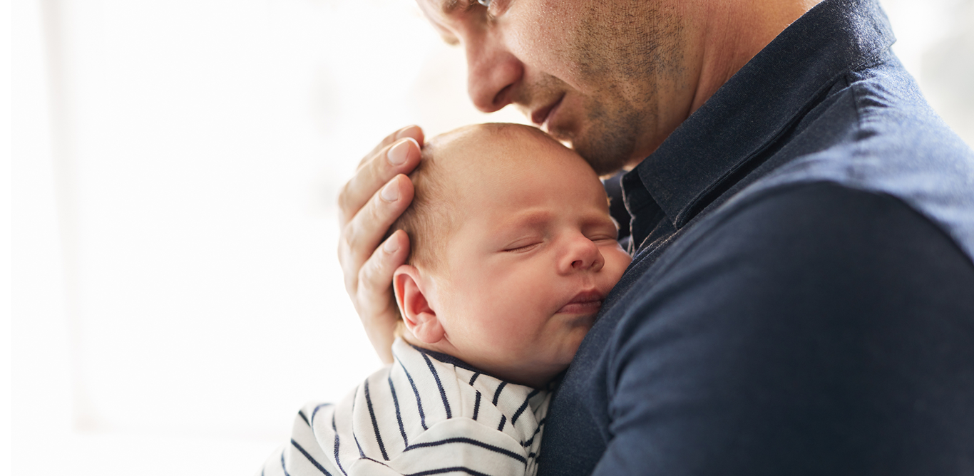 Father holding baby boy
