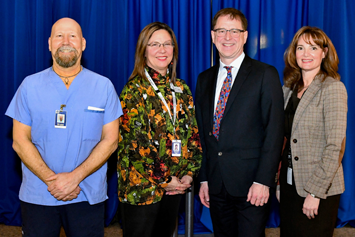 Bryan Gay, care aide at Menno Place, Karen Ballie, CEO of Menno Place, Adrian Dix, Minister of Health and Laurie Leith, Fraser Health vice president.