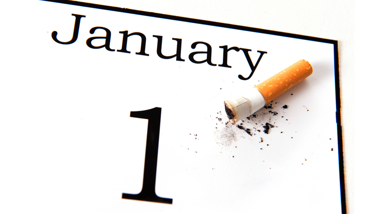 Used cigarette in a calendar