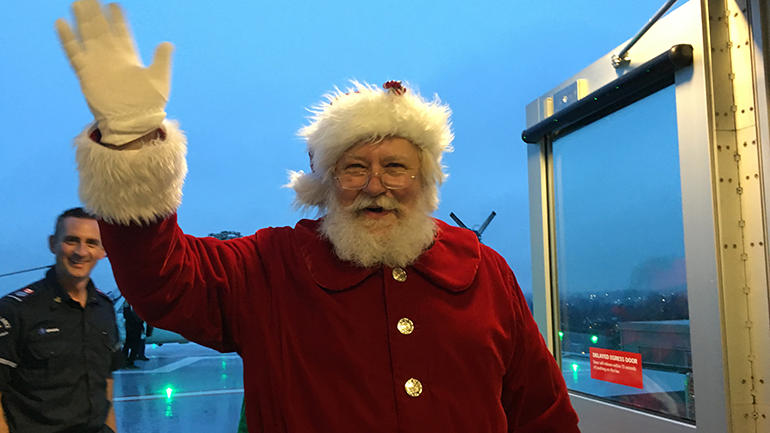 Santa Waiving