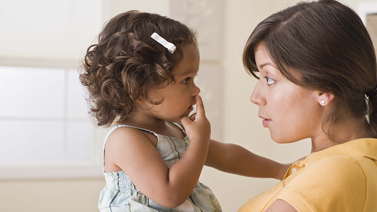 Mom talking to daughter