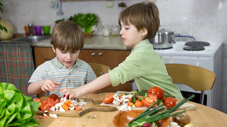 Kids helping prepare healthy food