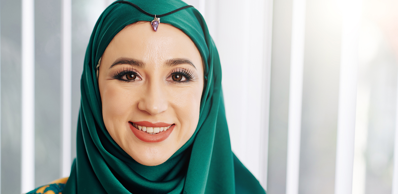 Smiling woman wearing a headscarf