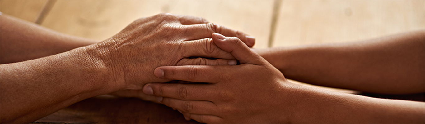 Two hands holding