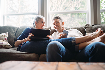 Couple looking at tablet