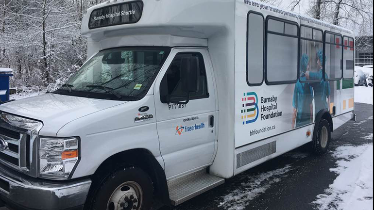 Photo of the Burnaby Hospital shuttle van featuring a full photographic wrap with the Burnaby Hospital Foundation logo