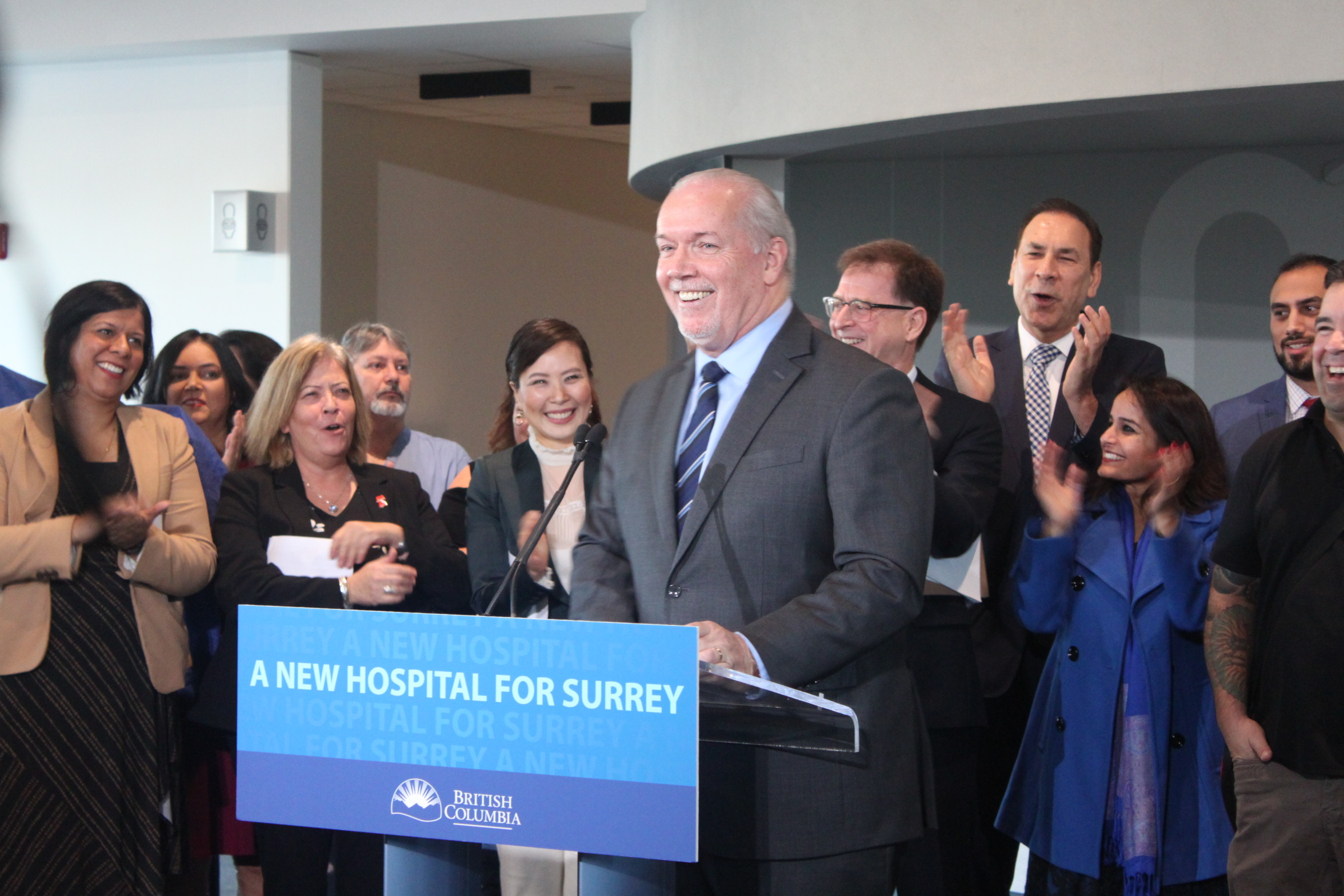 Premier John Horgan speaking at announcement of new Surrey hospital. 