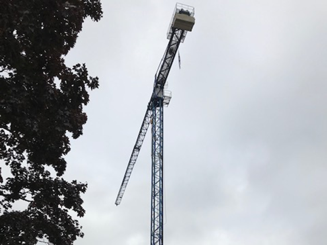 Crews work with cranes as initial framework of hospital begins to take shape - August 2019