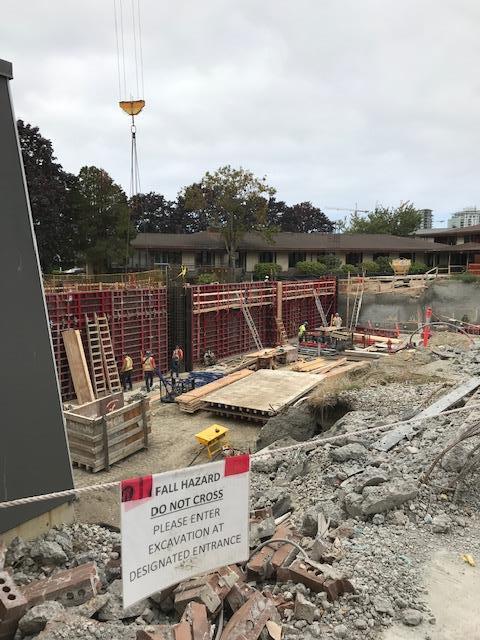 Construction crews at Peace Arch Hospital work in a deep excavation zone - September 2019.