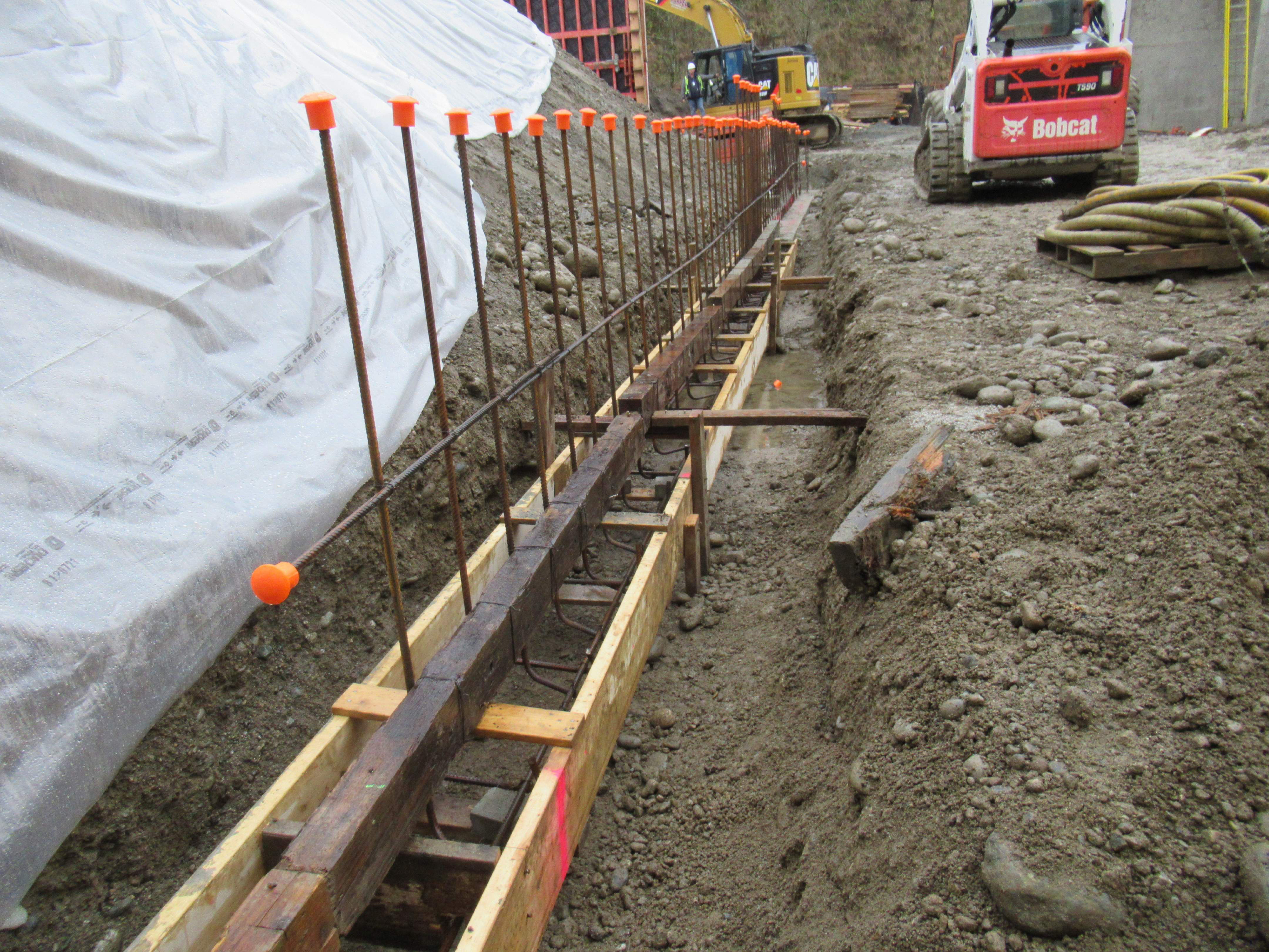 Mechanical and plumbing work in a deep excavation site – 12/16/19