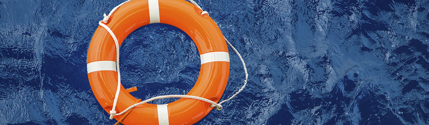 Safety equipment, Life buoy or rescue buoy floating on sea